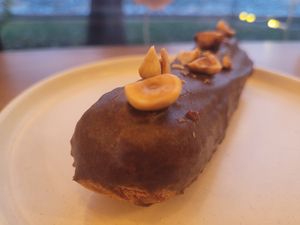 Eclair. Unfortunately, the coconut oil it was made with was slightly off, so that's all I could taste. at Olivka in Almaty