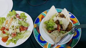 Pita falafel with hummus and salad at Mama Sababa in Vang Vieng