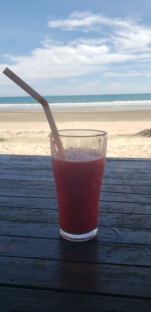 View. Partially drank watermelon shake. at JJ Resort & Restaurant in Koh Phayam