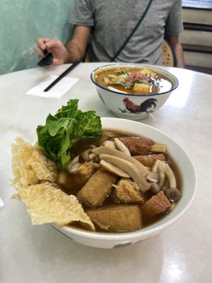 Bak Kut Teh noodles with an unimaginable amount of mushroom varieties and mock meats! Some VERY meaty textures too. (Laksa in the background! Very, very tasty he said)  at Ambience Tea House & Veggie Cafe - 茗楼茶艺素食馆 in Ipoh