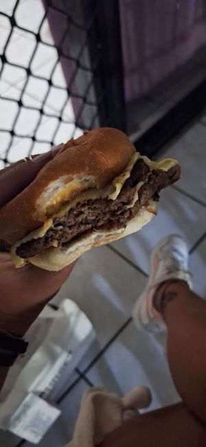 Double patty impossible burguer with vegan cheese and avo at Burger Urge  in Earlville