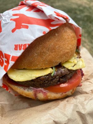 Pickles “birthday burger” fable mushroom patty, mayo, mustard , vegan egg, cheese  and pineapple  at Pickles Milk Bar in Carlton North