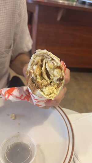 Burrito special -tofu, “sausage”, potato gems, pickled onions,  #Veganuary at Pickles Milk Bar in Carlton North