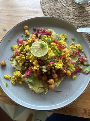 Scrambled tofu with beans on avo on toast  at Layback Rooftop in Weligama