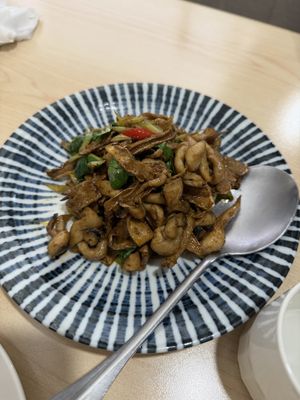 Stir fry king oyster mushroom with basil  at Veggienius in Taipei