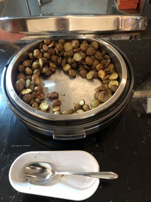 Roast potatoes with rosemary   at AUH - Pearl Lounge - TA in Abu Dhabi