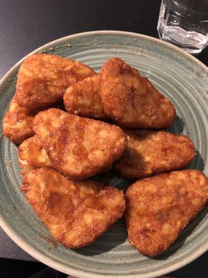 Hash browns with maple syrup!   at AUH - Pearl Lounge - TA in Abu Dhabi