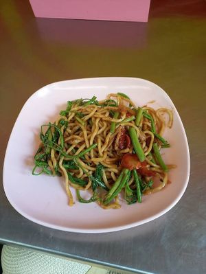 Stir fried water mimosa noodles at Lee Jae Veg in Bangkok