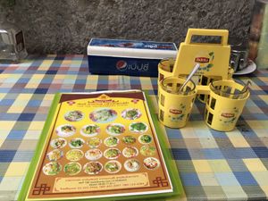 Menu and table   at Lee Jae Veg in Bangkok