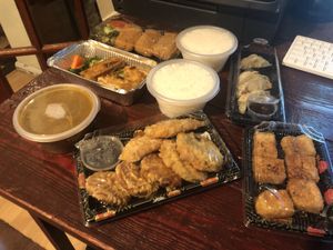 Selection of vegan options including spicy tofu, tempura veg, veg gyoza, teriyaki tofu, and katsu tofu  at Umami in Dorking