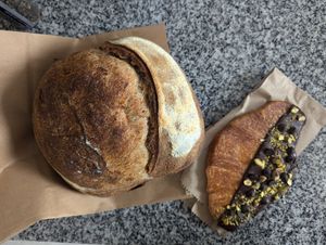 Pan de campo ($7000) y flat croissant ($7000) at Nueza in Buenos Aires