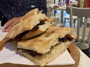 Delicious toasty warm bread!  at Schiaccia Passera in Florence