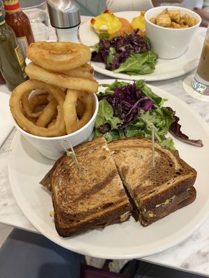 corned beef w onion rings  at Evviva - Wellesley in Toronto