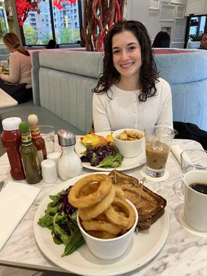 salmon benedict in the back  at Evviva - Wellesley in Toronto