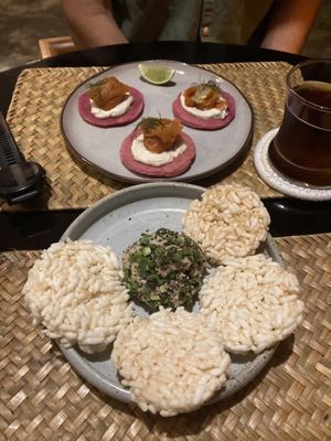 Carrot lox (faux salmon) and cashew cheese with dragon fruit pancakes (This was the smaller portion size. U can order in bigger too). In the front,  garlic and pepper cheese ball.  at Lost In Baan in Luang Prabang