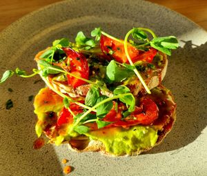 Smashed avocado on sourdough toast at Corneli's Bistro in Staines-upon-thames