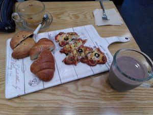 Ginger tea, red bean bread, salty bread, pizza, chocolate drink at Rainbow Crust in Busan