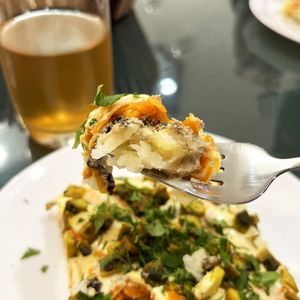 Veganized Mimoza salad (traditional Russian salad for holidays). The "fish" part is tofu and nori there. Omg, every bite is just heaven! at BORSHÖF in Yerevan