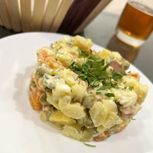 Veganized Olivier salad (traditional Russian salad for holidays) with vegan "doctor's" sausages and vegan mayo at BORSHÖF in Yerevan