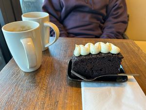 Great vegan chocolate cake - almost chewy, with fantastic topping which tastes a bit like raw cake mixture (in a good way!)   at Coffee In the Wood in South West London