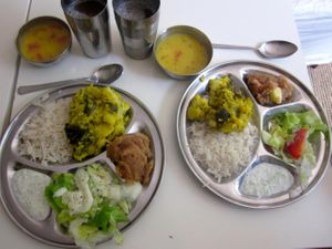  Delicious meal of rice, dahl, vege curry, yogurt raita, salad, drink and dessert. 5 euros at Vegetarian Dinner Club in Amsterdam
