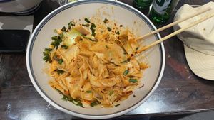 the famous biáng biáng noodles (𰻞)  at Shangzhai Leizhali Noodle Restaurant - 尚寨嫽扎咧面馆(钟楼店) in Xian