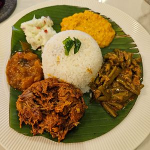 signature dish: curry leaf coconut rice at Kunthaville in Central Singapore