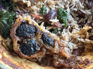 Oxtails after being reheated the next day.  at Sedjedo Kitchen in Bellmore