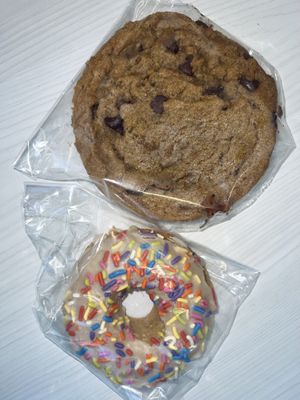 Donut and chocolate chip cookie, both vegan and both delicious  at Erie Food Co-op in Erie