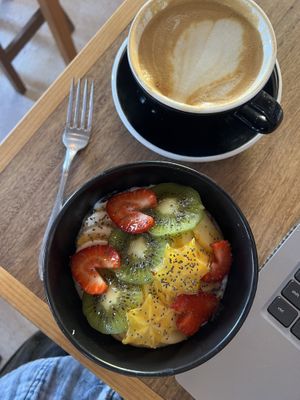 Latte and fruit bowl   at Café Caracol Púrpura in Oaxaca