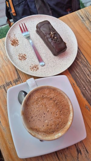 Cappuccino and vegan snickers bar at Kaffeehaus in Arequipa