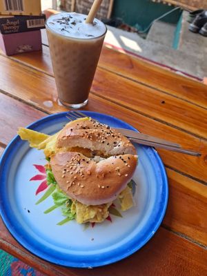 Breakfast Bagel & iced lavender latte at Free Bird Cafe Pai in Pai