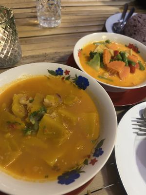 pumpkin curry (front) chickpea veg curry (behind) both so good  at Free Bird Cafe Pai in Pai