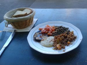 Vegan starter: red rice, hummus, lentils, tomato salad and fried eggplant

Homemade bread at L' Ecomotive in Marseille