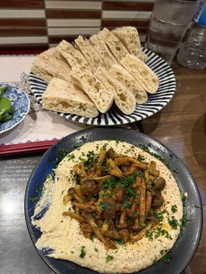 Hummus with Mushrooms and pita  at Tel Aviv Kyoto - テルアビブ京都 in Kyoto