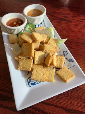 Deep Fried Tofu (labeled vegan appetizer). Served with sweet cucumber sauce and peanut sauce. at Joy's Pattaya Thai Restaurant in Richfield