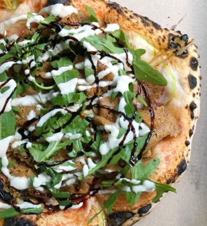 Pizza with vegan pastrami and arugula at Daner Pizza in Tbilisi
