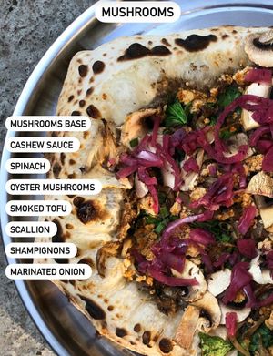 Vegan pizza with mushrooms at Daner Pizza in Tbilisi