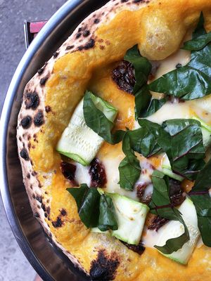 Special pizza of the 27th Feb: pumpkin coconut base, cheesy mozzarella vegan sauce, zucchini ribbon, sundried tomatoes, chard
 at Daner Pizza in Tbilisi
