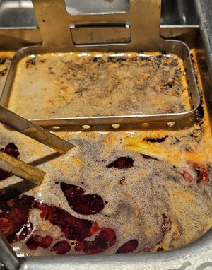 put it all in here at Haidilao Hot Pot in Bangkok