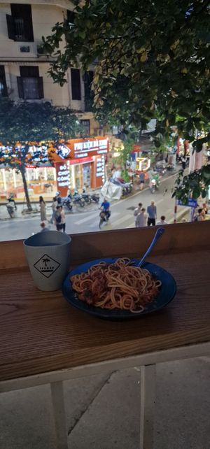 Spaghetti on the balcony overlooking the road at iVegan Supershop Old Quarter Hanoi - Healthy Plant Based Cafe in Hanoi