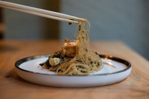Mung dahl noodles with silky tofu, edamame and pak choi at Dastra in Turin