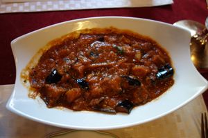 Banjan Qorma (fried aubergines in a sauce made of onions, tomatoes, fresh herbs, and garlic, with traditional spices) (vegan) at Weissberg Restaurant in Saarbrucken