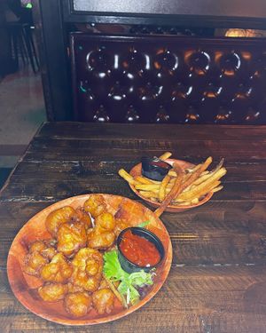 Vegan Manchurian Cauliflower with Vegan French Fries   at The Haberdasher in Mobile