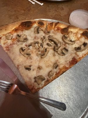 Vegan cheese pizza slices w/ mushrooms  at Moon River Pizza in Jacksonville