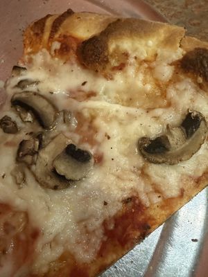 Vegan cheese closer  at Moon River Pizza in Jacksonville
