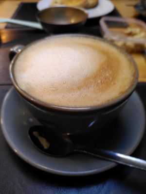 Decaf oat latte (February 2024) at Pennau Craft & Coffee Shop in Aberystwyth