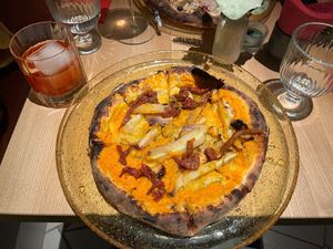 Veggie Harvest pizza and Boulevardier cocktail   at Franklin in Vilnius