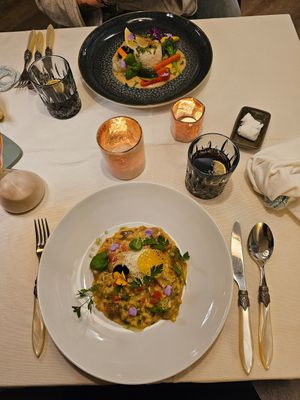 I tried the porcini mushroom risotto with vegetables, and my friend had the nasi goreng with peanut sauce. at Tioman in Gyor