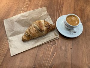 Vegan croissant and coffee at NYC Bagel and Coffee House in New York City